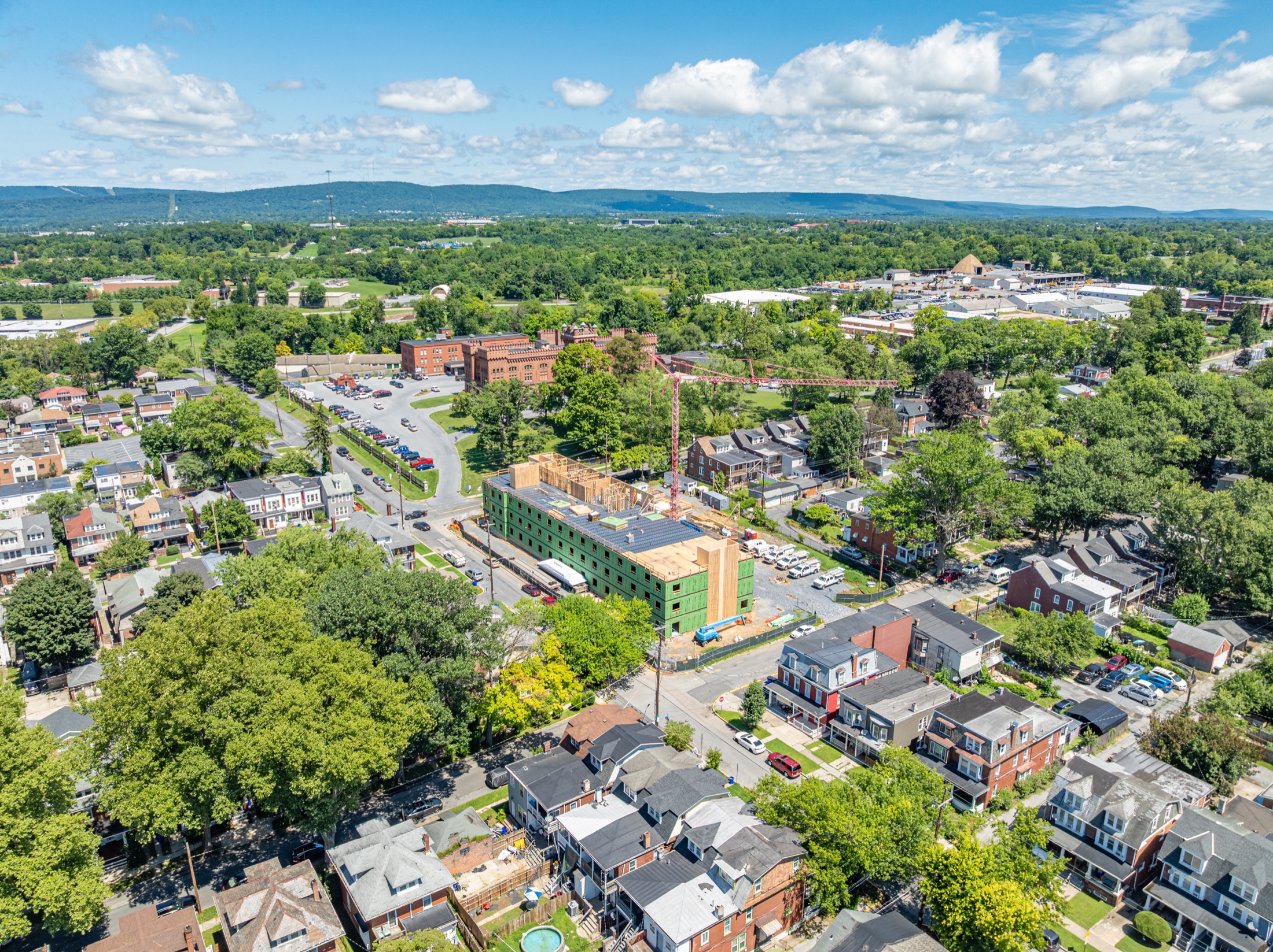 Wide aerial placing Woodward Lofts in the Harrisburg city context